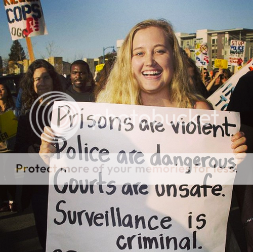 photo nicole-holding-poster_zpshjneejw3.png